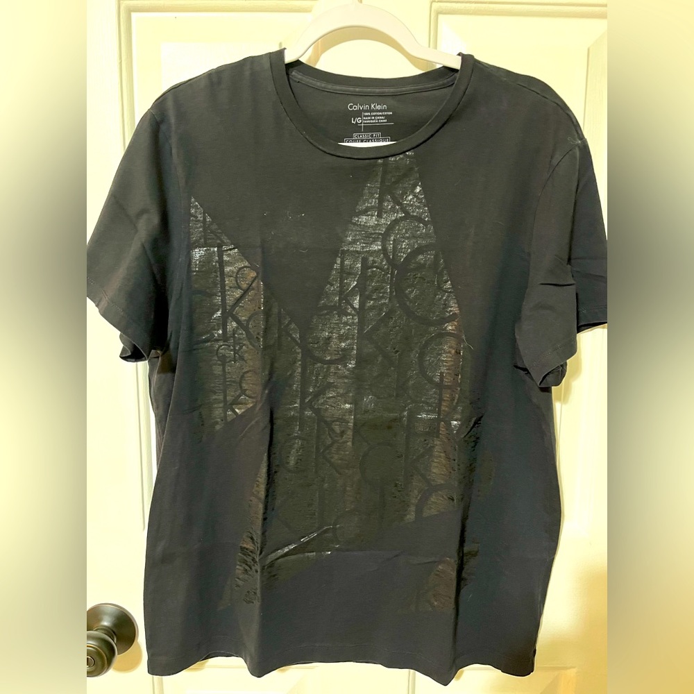 Calvin Klein black T shirt.